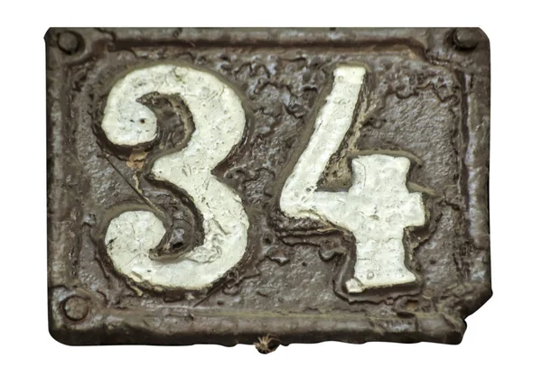 Old Retro Weathered Cast Iron Plate Number Closeup Isolated White — Stock Photo, Image