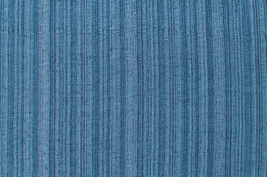Silk and linen blue color natural fabric texture closeup as textile background clipart