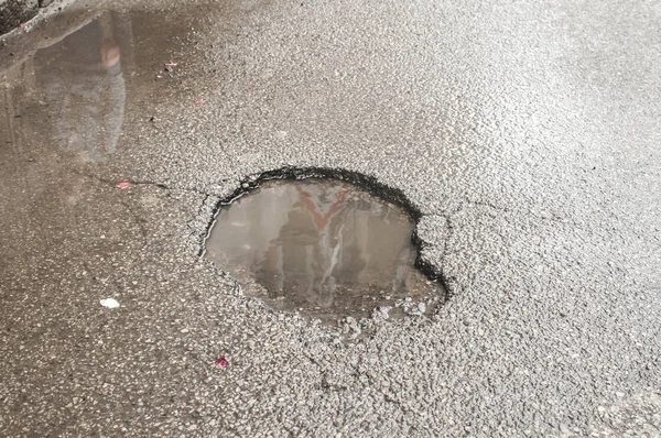 Pothole Puddle Resulting Erosion Damaged Road Asphalt Surface Closeup — Stock Photo, Image