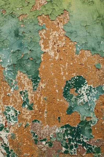 ひびの入った古い風化グランジ剥離ペイント アートの背景としての壁の表面のクローズ アップの漆喰 — ストック写真