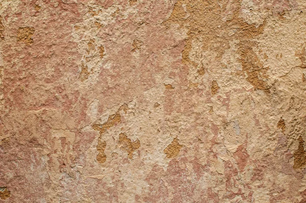 風化古いグランジ背景としての漆喰壁のクローズ アップのひび — ストック写真
