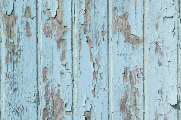 旧风化的杂草木板栅栏墙面特写作为木制背景 — 图库照片
