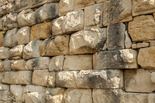 大石头砂岩古代干石墙特写作为石料背景 — 图库照片