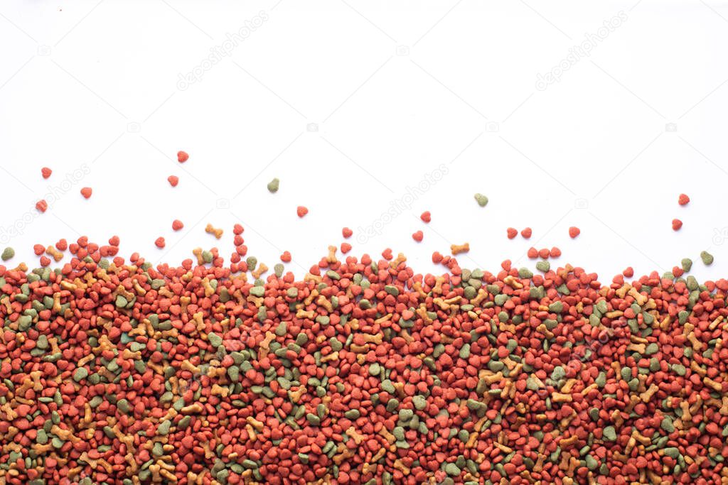 Colorful Dried dog food background. Top view grain pet food banner background  with copy space of test design. Above or Top view. food panorama banner