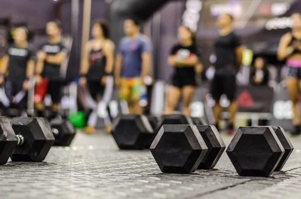 Sports dumbbells in modern sports club