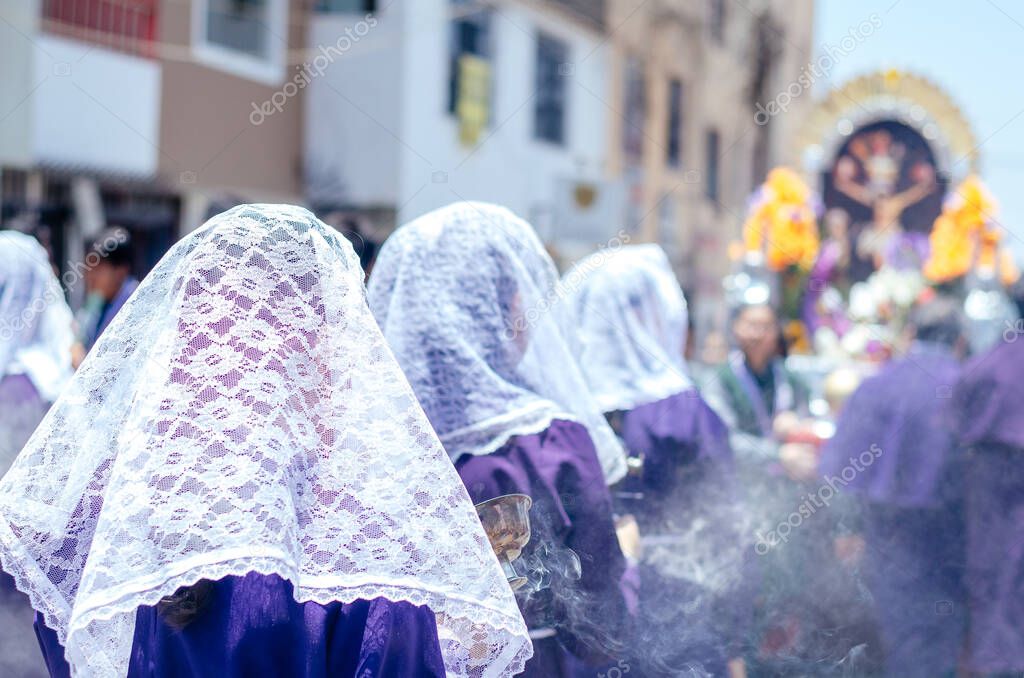 Female incense burners following the procession of the Lord of Miracles every October