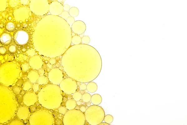 bubbles on the water from yellow to white, textures abstract round fonts