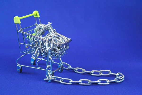 shopping cart with metal chain, buy chain of metal, blue background