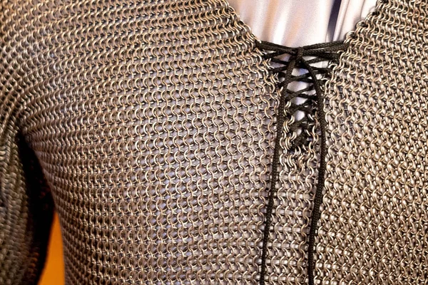 the chest part of the chain mail in a small ring of metal shape, old chain mail from the middle ages