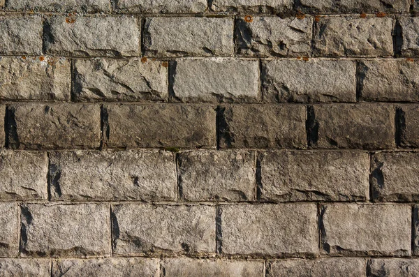 Background of a large old brick, gray large brick — Stock Photo, Image