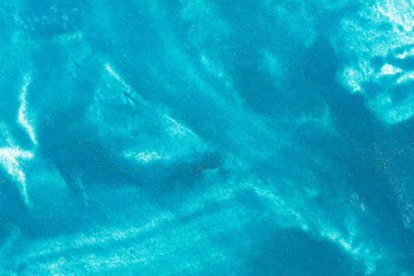 tuval kağıt mavi arka plan üzerinde guaj doku yakın çekim