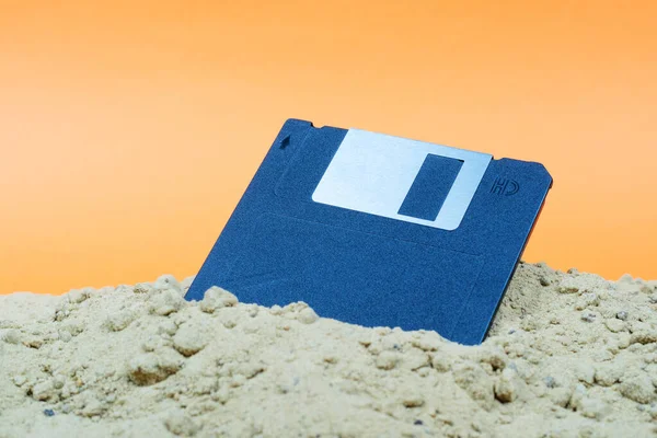 Old Black Floppy Disk Half Covered Sand Forgotten Discarded Technology — Stock Photo, Image