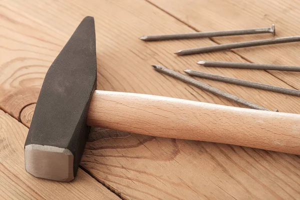 Big Hammer Five Nails Wooden Texture Carpenter Tools — Stock Photo, Image