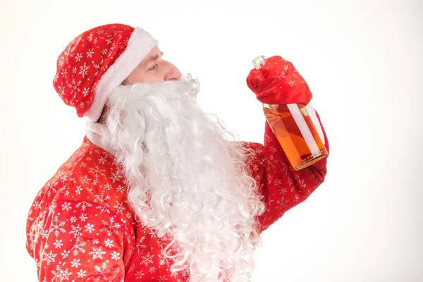 Santa Claus Drinks Bottle Whiskey White Background Clothes Silvery Snowflakes — Stock Photo, Image