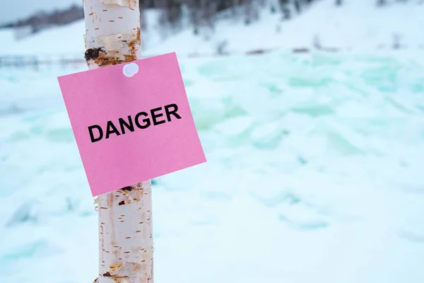 Sign Inscription Dangerously Attached Birch Stick Background Broken Ice Winter — Stock Photo, Image