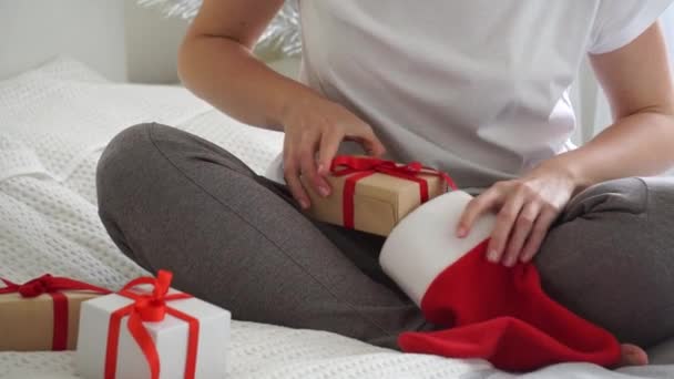 Festive Morning Home Woman Hand Pulls Out Christmas Sock Gift — Stock Video