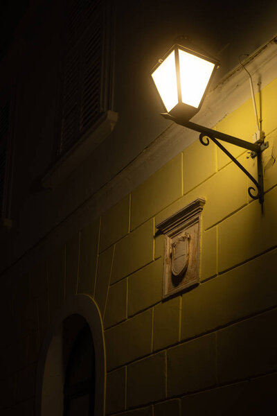 Street lamp in the city of Cres (Croatia) in the evening