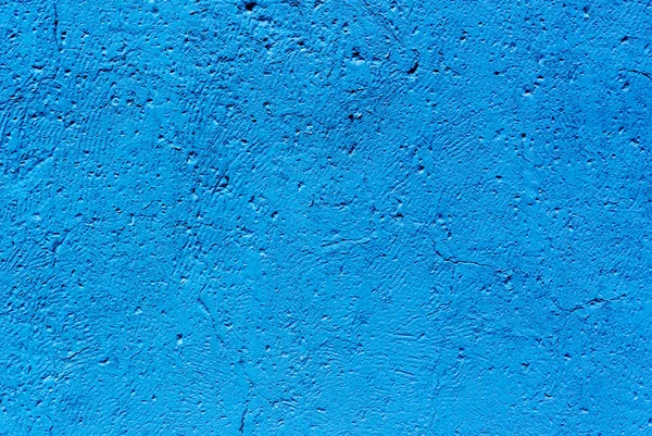  Mavi boyalı alçı yaşlı kaba doku ile bir duvar fotoğrafı