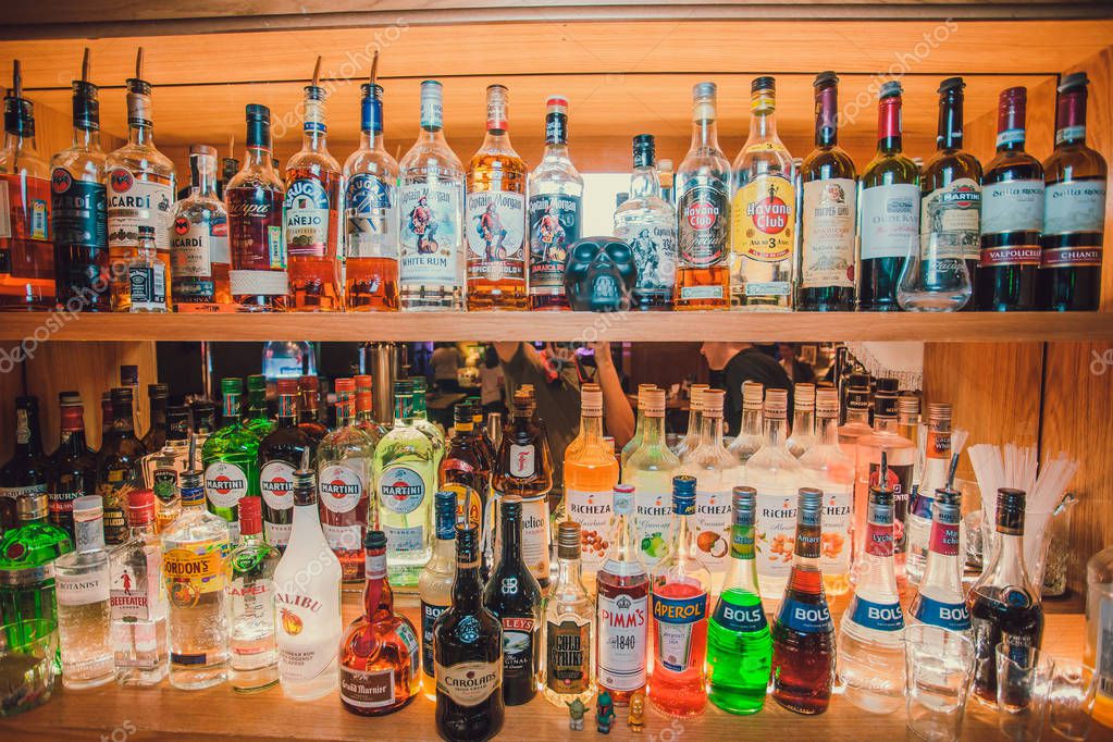 Ufa, Russia, Darling Bar, 20 November, 2018: Various alcohol bottles in a bar, back light all logos