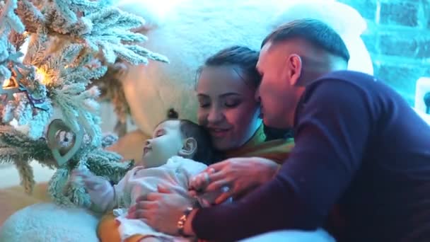 Happy smiling family near the Christmas tree. — Stock Video