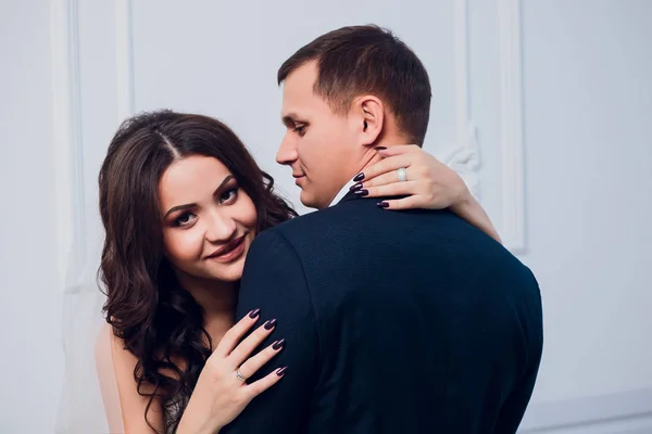 Family studio photography. Wedding photography pair. Husband and wife.