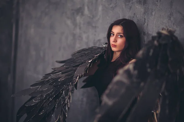 Fallen black angel with wings. Sexual woman. — Stock Photo, Image