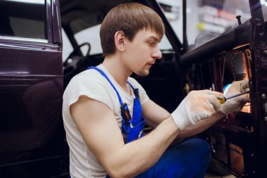 man hands repair left door Car locks mechanic