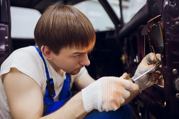 man hands repair left door Car locks mechanic