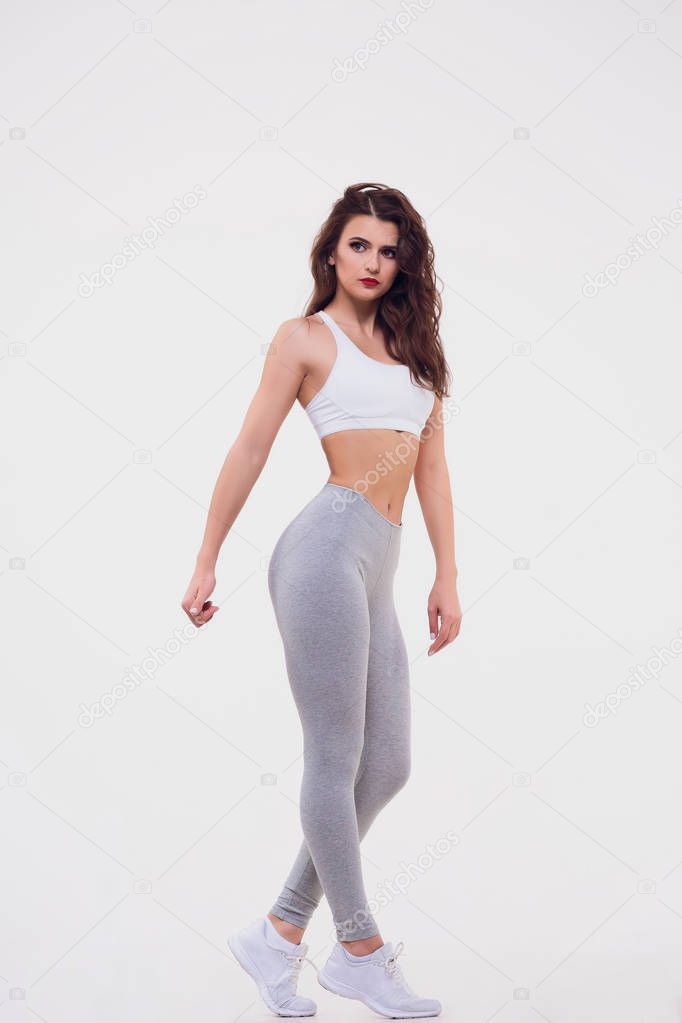 Figure sports girl on white background