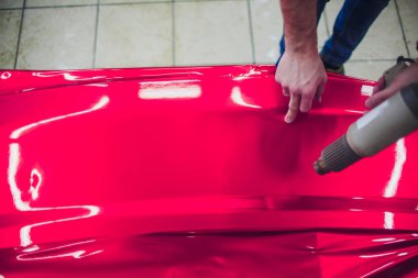 Araba kaydırma uzman vinil folyo ya da film sarma koruyucu film yat, tekne, gemi, Araba, mobil ev araba koyarak. pembe kırmızı film el çeker