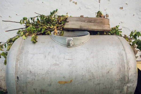 hot water system boiler old dumped in street