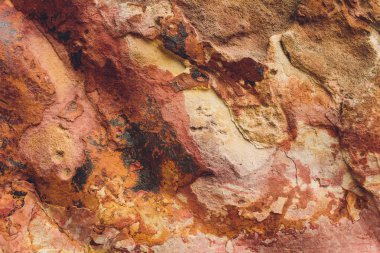 Kaya katmanları - renkli oluşumlar kayaların yığılmış yüzlerce yıl. Büyüleyici doku ile ilginç arka plan.