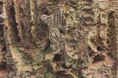 Kaya katmanları renkli oluşumları kaya yüzlerce yıl yığılmış. Büyüleyici doku ile ilginç arka plan.