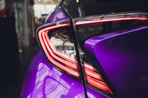 Detail on rear light blue car purple — Stock Photo, Image