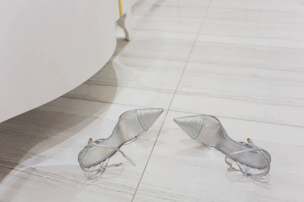 Shoes, kitchen, woman took off her shoes. — Stock Photo, Image