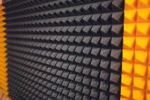 Close up of sound proof coverage in music studio.