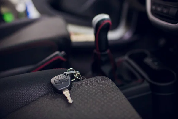 keyring and remote control key in vehicle interior