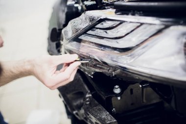 İşçi el araba boya koruma film sarma otomatik far yükler