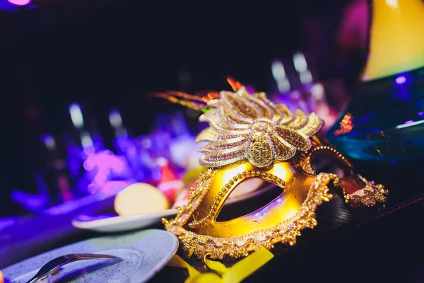 Italian carnival venetian golden mask. Mysterious event, party.