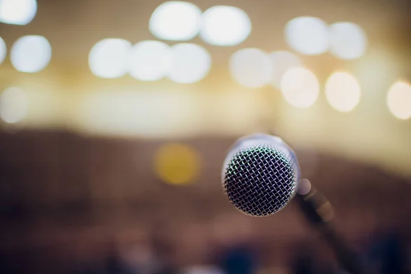 microphone on stand up comedy stage with reflectors ray, high contrast image