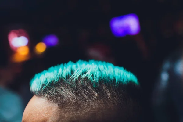 man, turquoise hair, blue hair, close up.