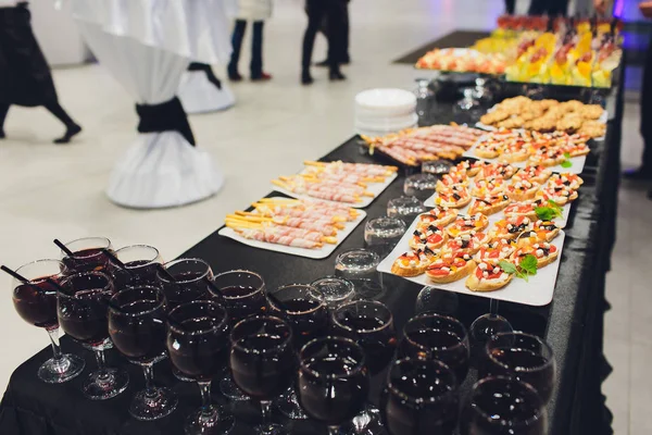A lot of cold snacks on buffet table, catering. — Stock Photo, Image