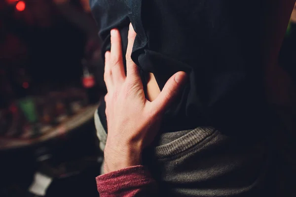 Happy love couple holding hands in the bar. — Stock Photo, Image