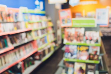 Abstract blur and defocused library and book comics store shop interior for background.