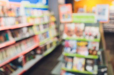 Abstract blur and defocused library and book comics store shop interior for background.