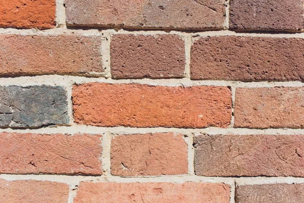 Parede de tijolo vermelho rústico usado para a construção da casa . — Fotografia de Stock