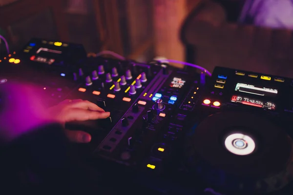 Digital midi controller panel with colorful disco light, Dj turn table console sound equipment. — Stock Photo, Image