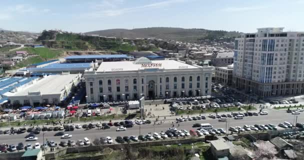 Dushanbe, Tadzjikistan-21 december 2018: en av landmärke byggnader i Tadzjikistan huvudstaden mehrgon Tadzjikistan. — Stockvideo