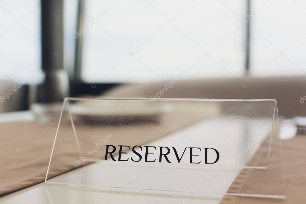 Elegant Restaurant Table Setting Service for Reception with Reserved Card.