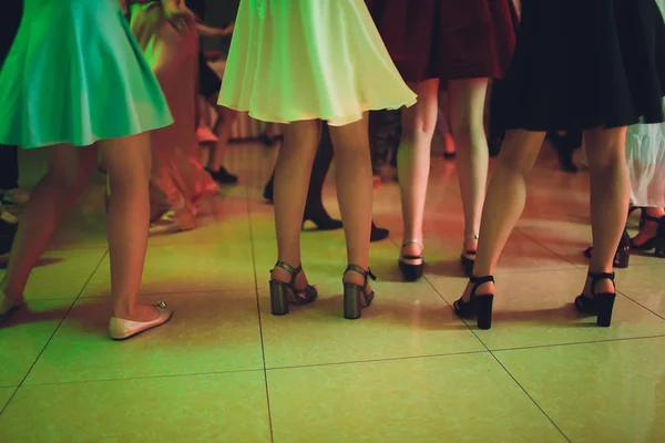 Close up of elegant female legs walking away. — Stock Photo, Image